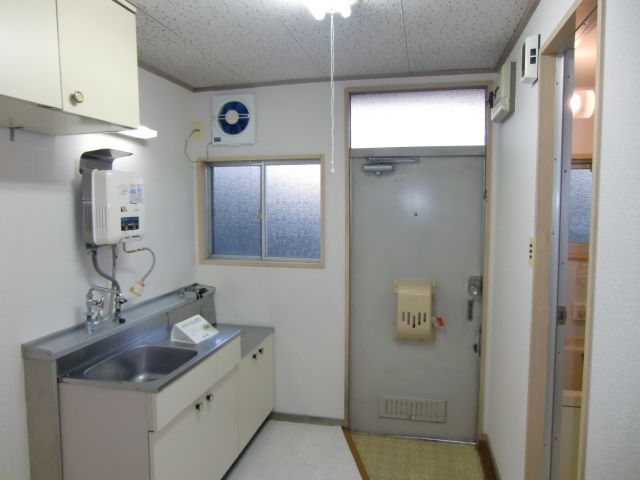 Kitchen. Will also clean up cookware There is also housed on top of the kitchen. 