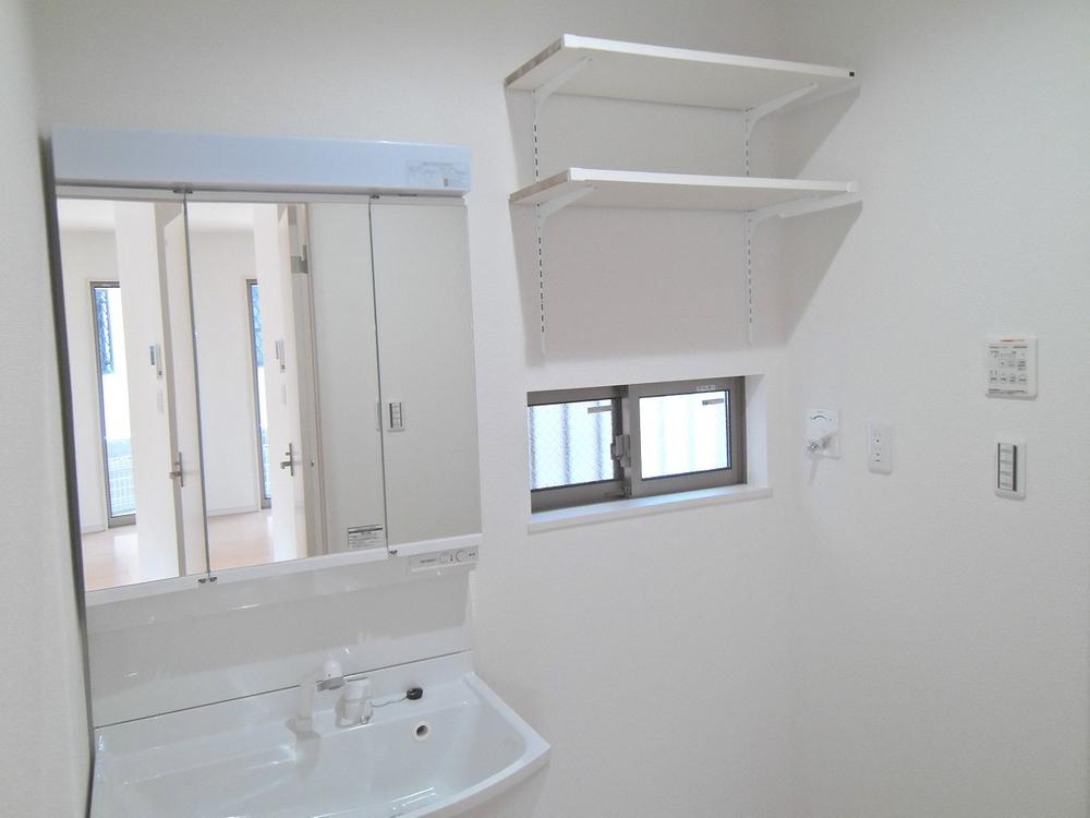 Wash basin, toilet. Vanity with a three-sided mirror shower