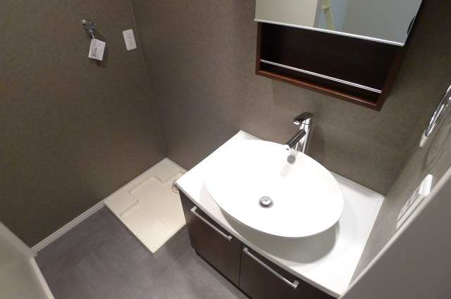 Washroom. Stylish basin dressing room (The photograph is an image)