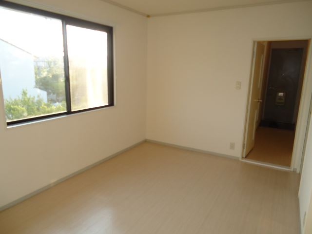 Living and room. The room is also bright and there is a window because it is a corner room.