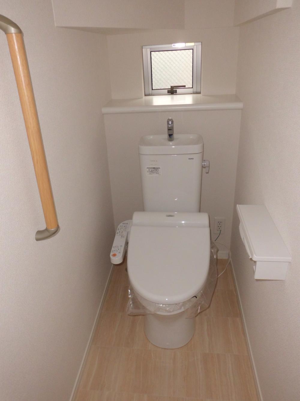 Toilet. With warm water washing toilet seat