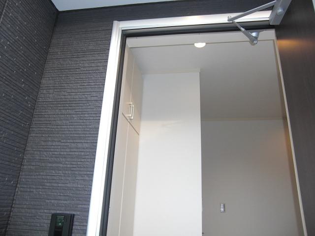 Entrance. Fashionable stylish entrance door! Visitors will see at a glance at the TV monitor with intercom.