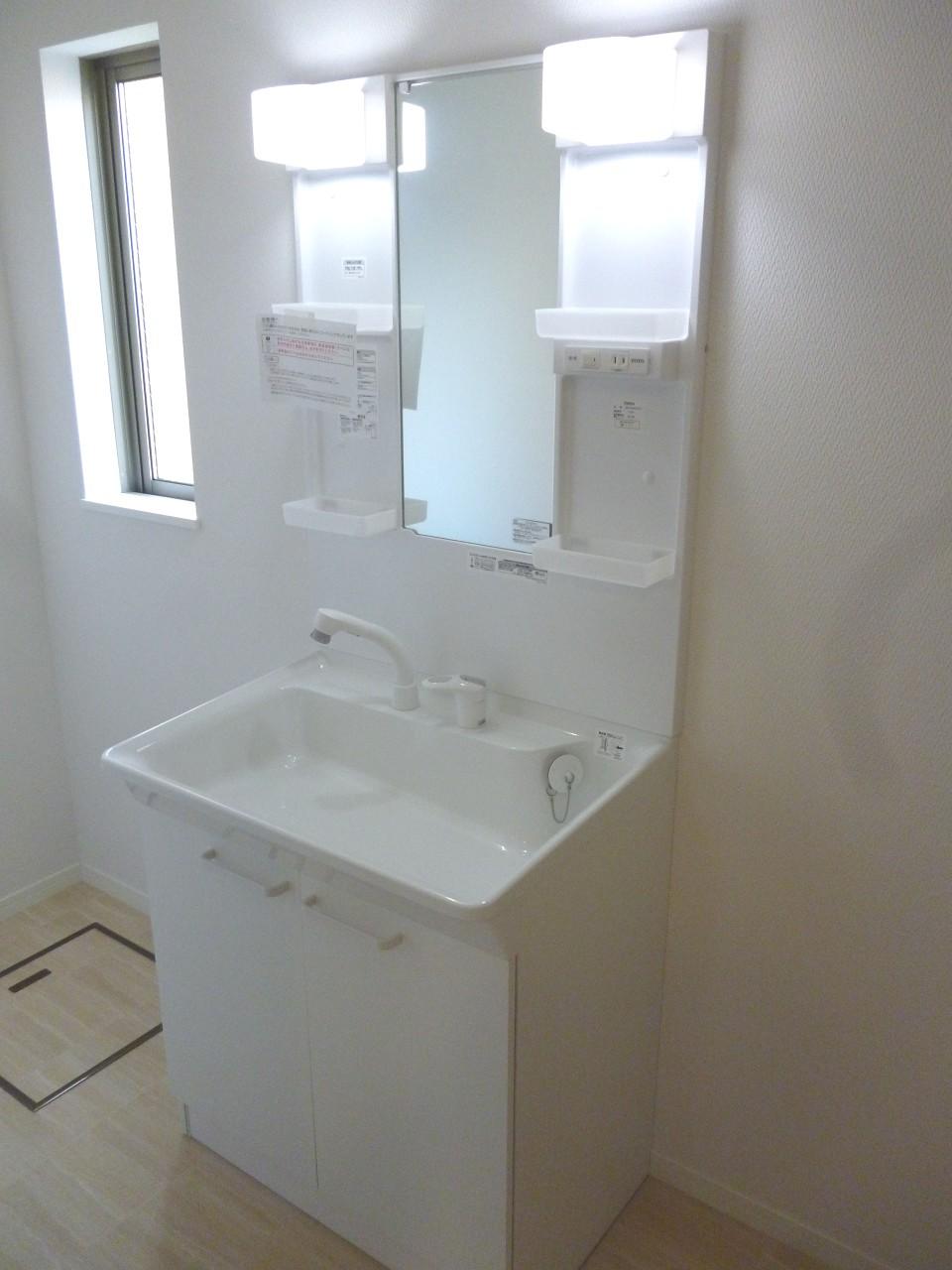 Wash basin, toilet. Vanity with shower!