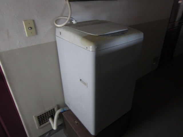 Washroom. Outdoor washing machine storage is, Corridor