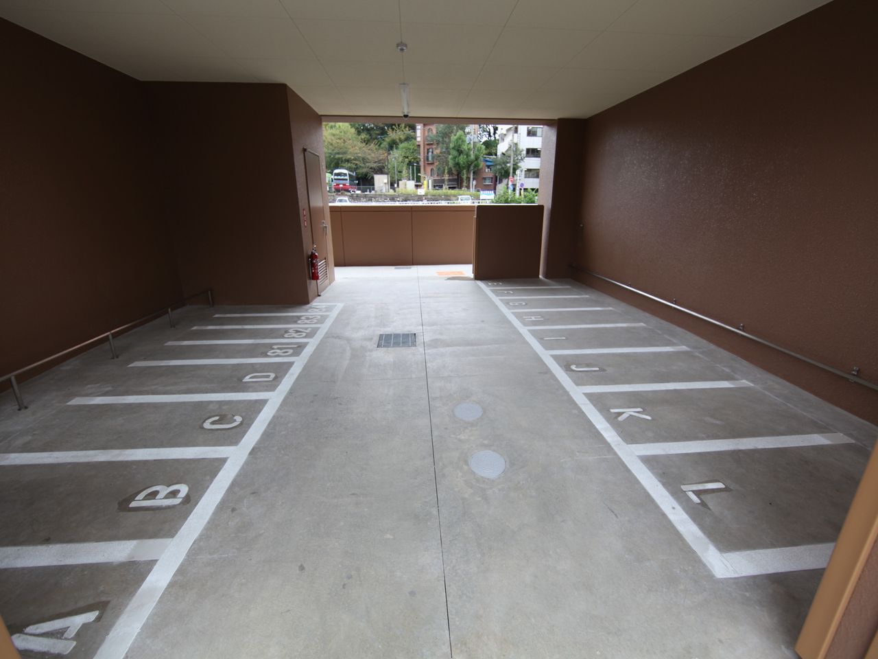 Entrance. Roofed bike storage