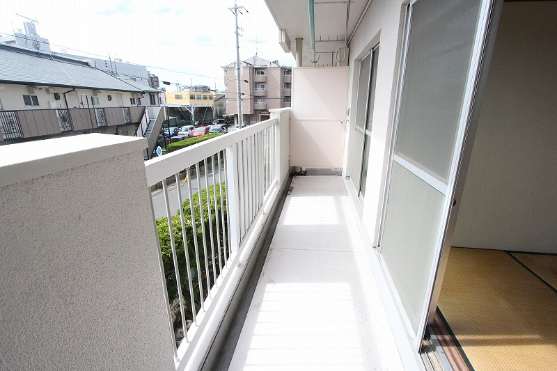 Balcony. It puts a washing machine to a wide balcony. 