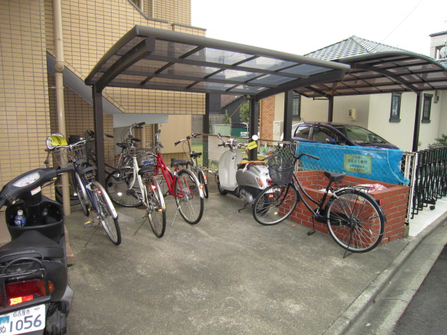 Other common areas. Bicycle parking and right-hand rear side garbage yard