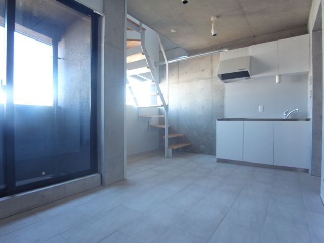 Living and room. It is fashionable in a bare concrete wall