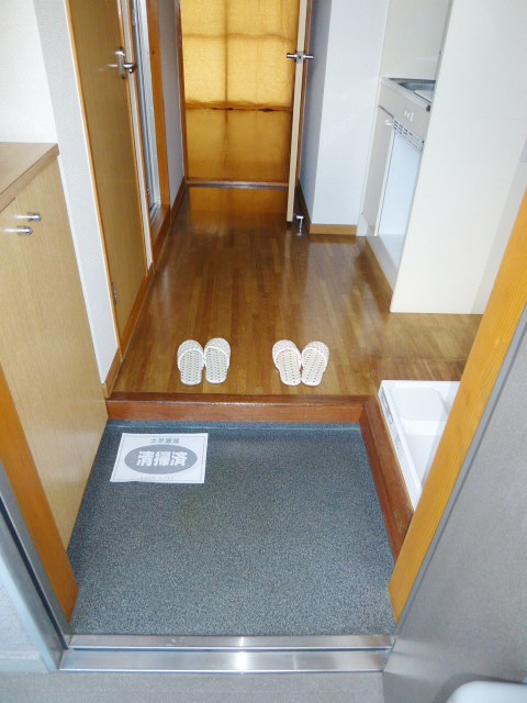 Entrance. With a shoe box