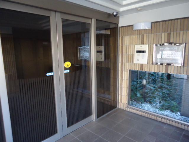 Entrance. Of course, it is auto-lock system with a TV monitor.