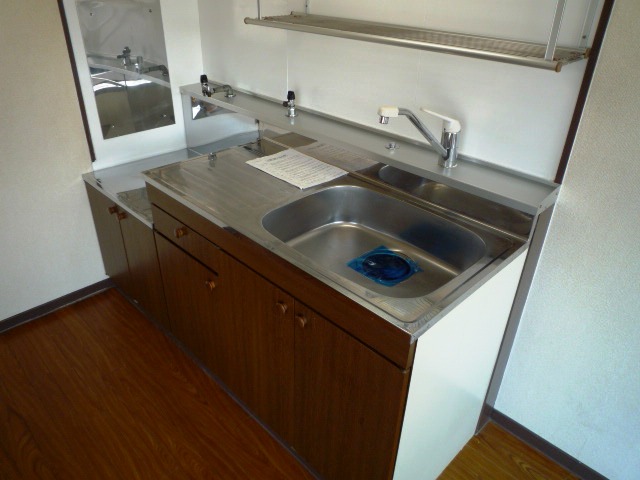 Kitchen. The image is a separate room in the same property. It will honor the current state.