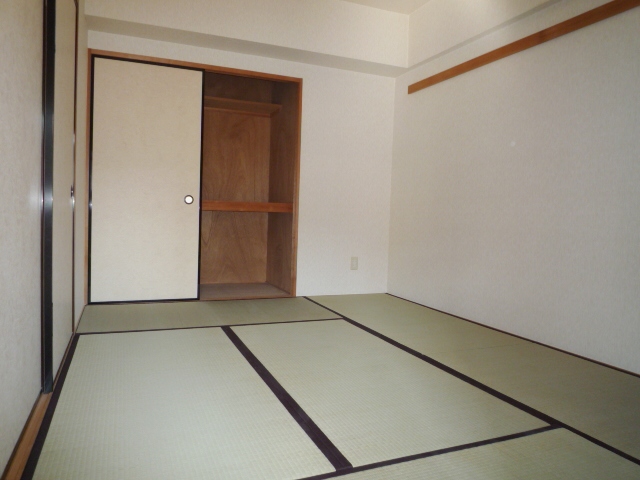 Living and room. Family is happy living next to a Japanese-style room