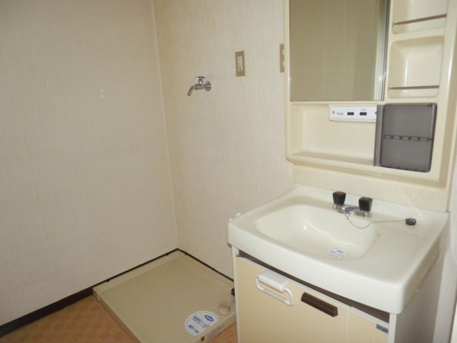 Washroom. There is a separate sink and washing pan to wash. 