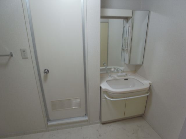 Washroom. With separate wash basin.