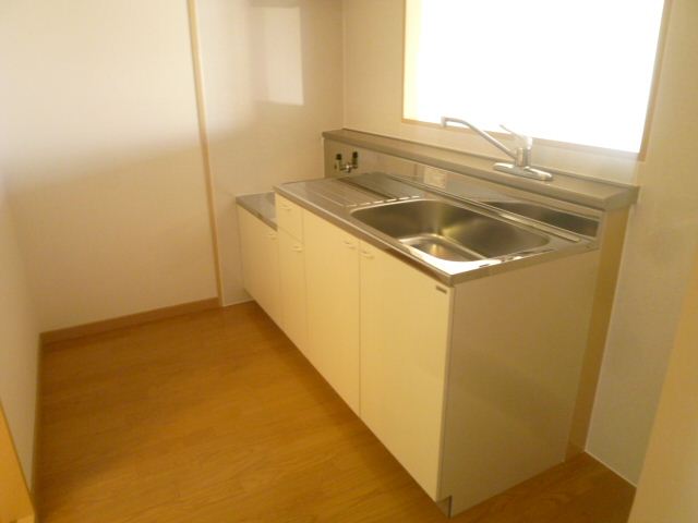 Kitchen. Is It is attractive spacious kitchen. 