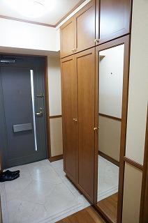 Entrance. Entrance There shoes black clock