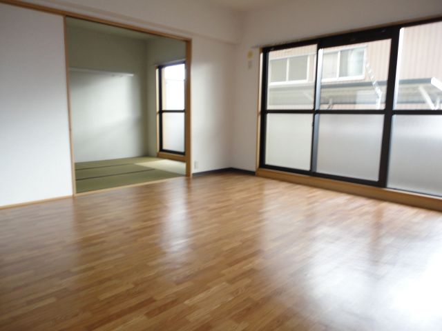 Living and room. Bright living room facing the veranda