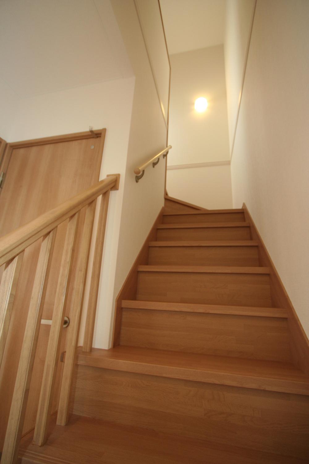 Other. Some of the steps and rails open and bright space in the open railing.