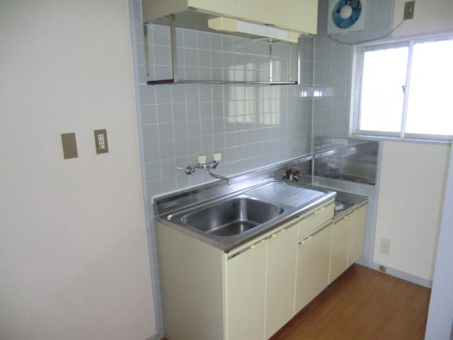 Kitchen. Small window with a bright kitchen space