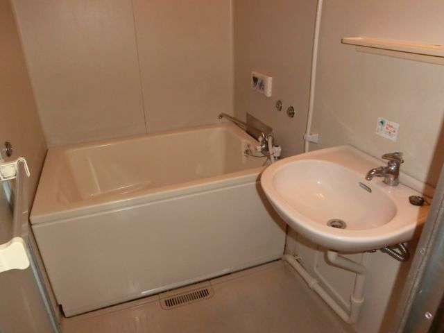 Bath. It is a bathroom with a wash basin