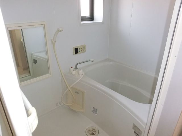 Bath. It is a bathroom attached with Reheating & small window! 