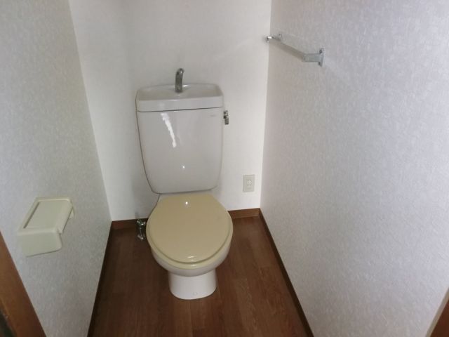 Toilet. Toilet of small window and with power