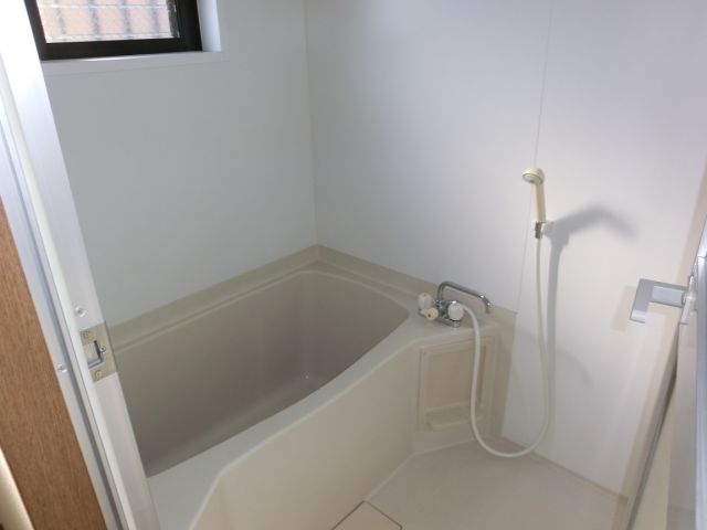 Bath. It is a bathroom with a ventilation easy small window