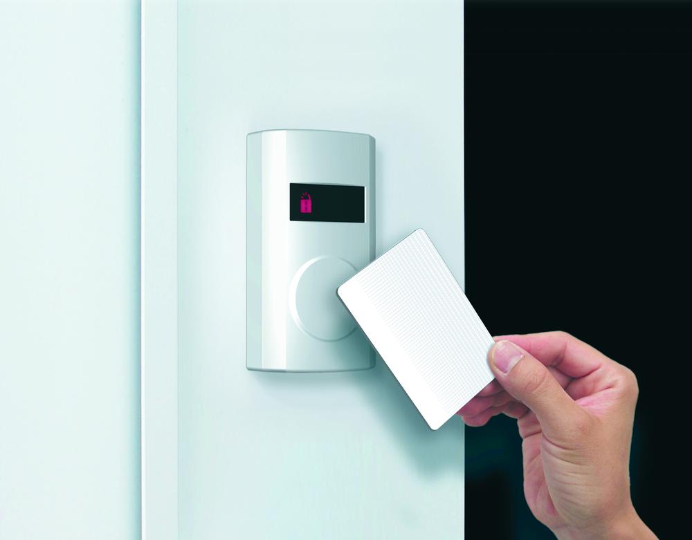 Security equipment. Locking and unlocking the front door just holding the card-type key