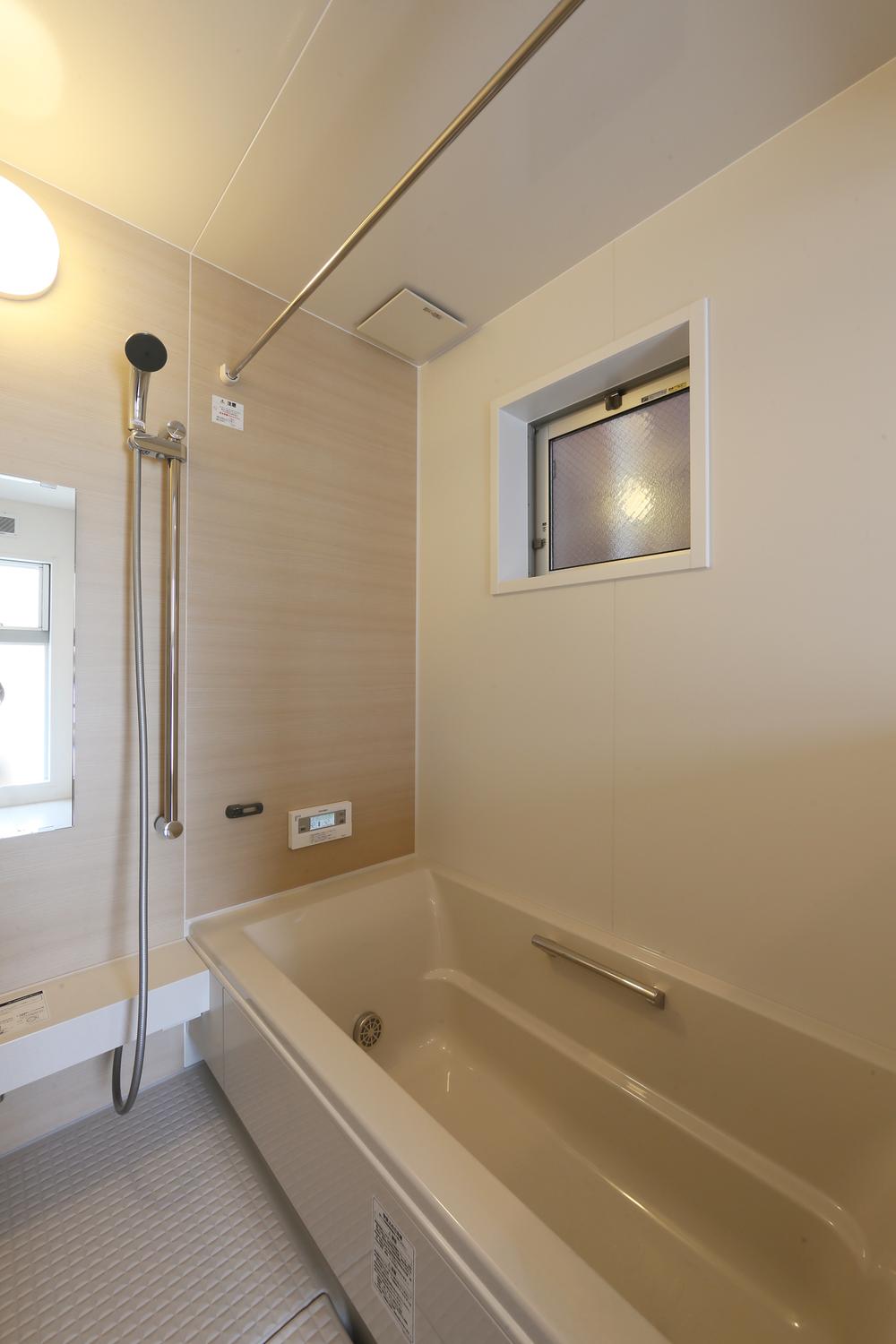 Bathroom. Unit bus with a simple functional beauty. A point of interest also ties to the wash room. 