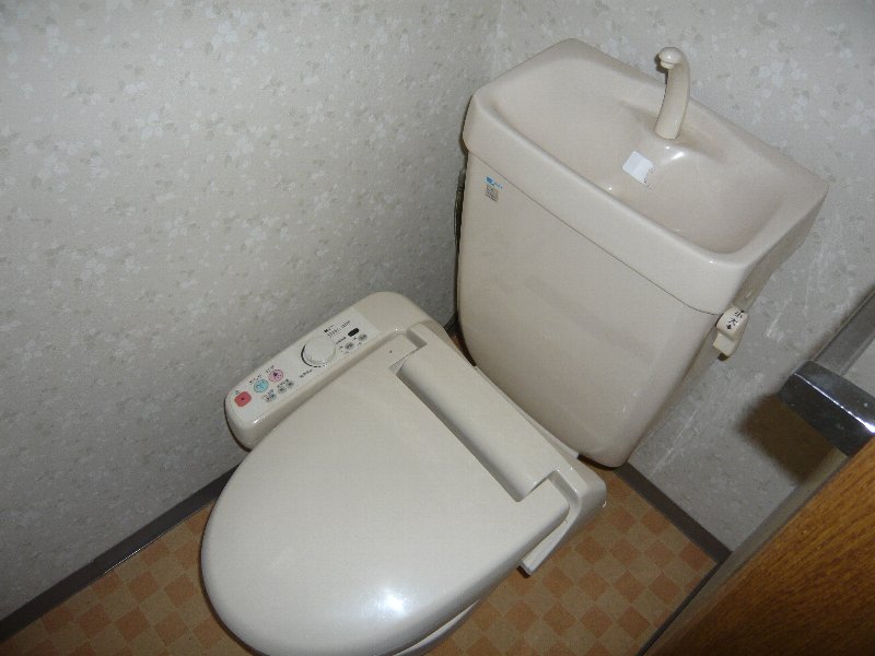 Toilet. Washlet is with