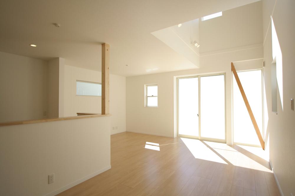 Living. Living room bathed in bright light and airy full there is a blow-by. 