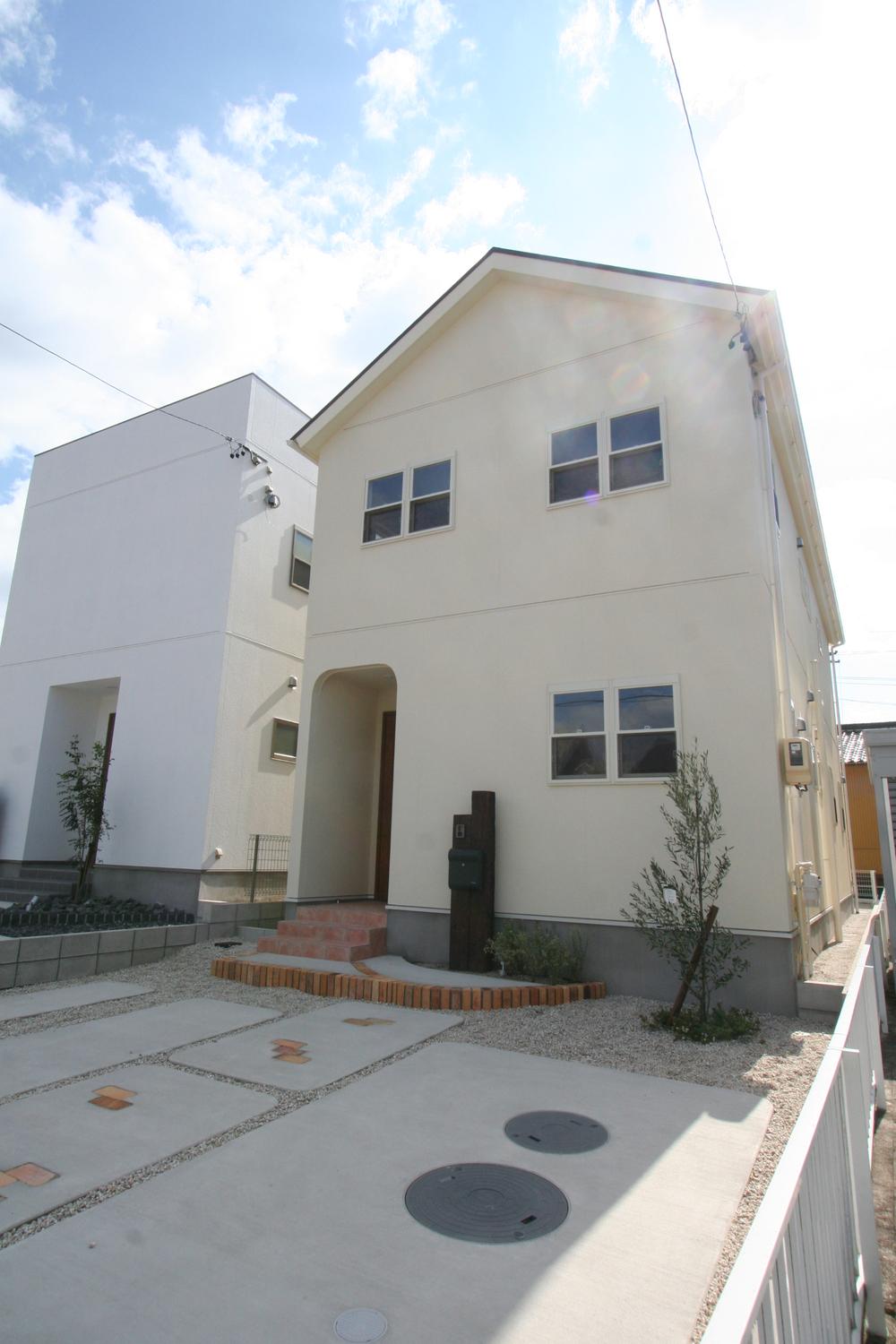 Local appearance photo. Appearance of the gable roof natural style. 