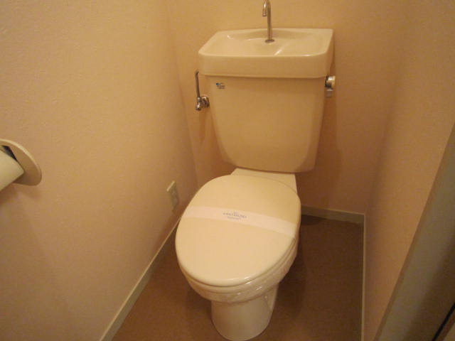 Toilet. Winter is useful heating toilet seat