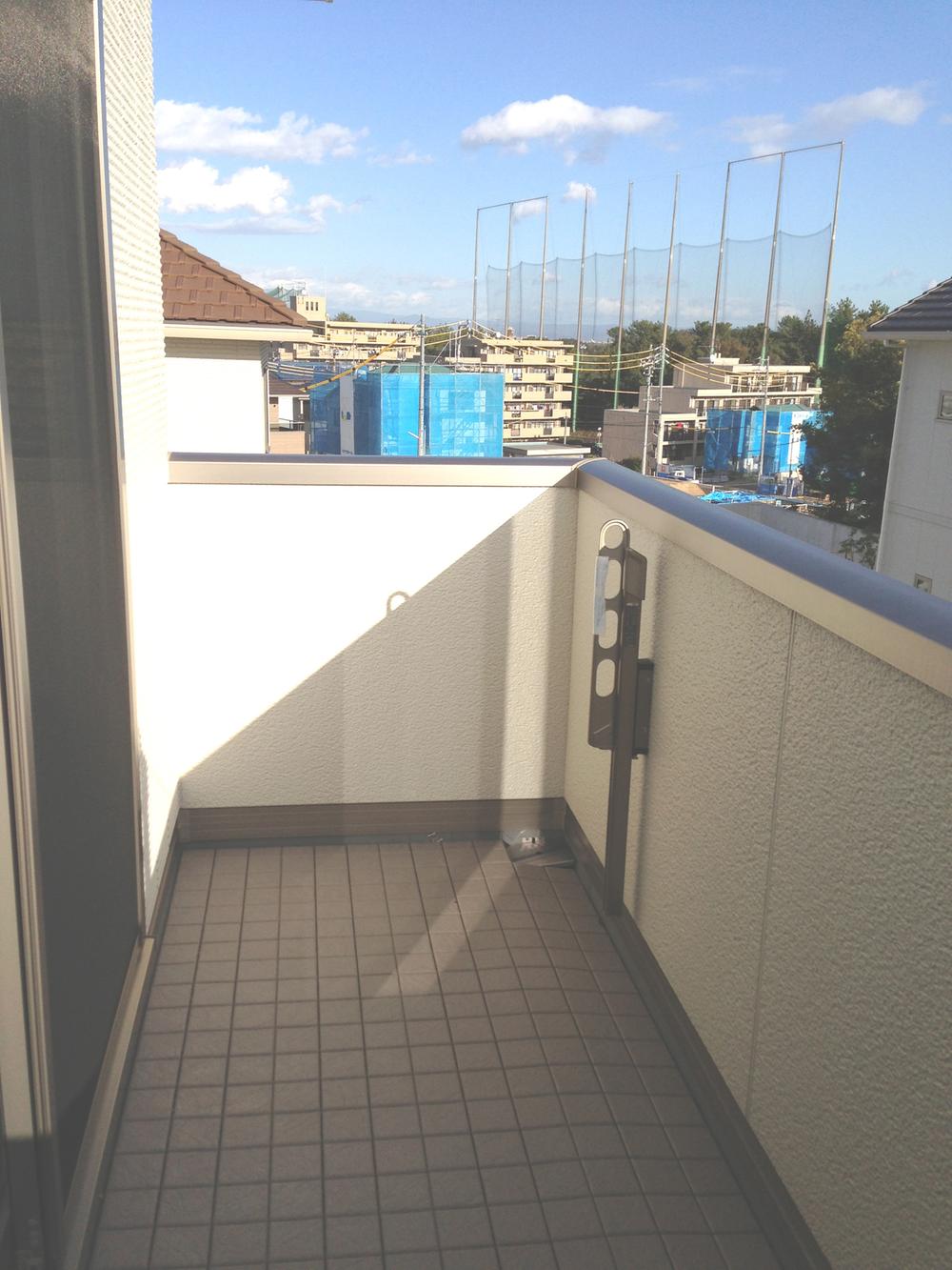 Balcony. You can hang out a lot of laundry and a futon at a time.