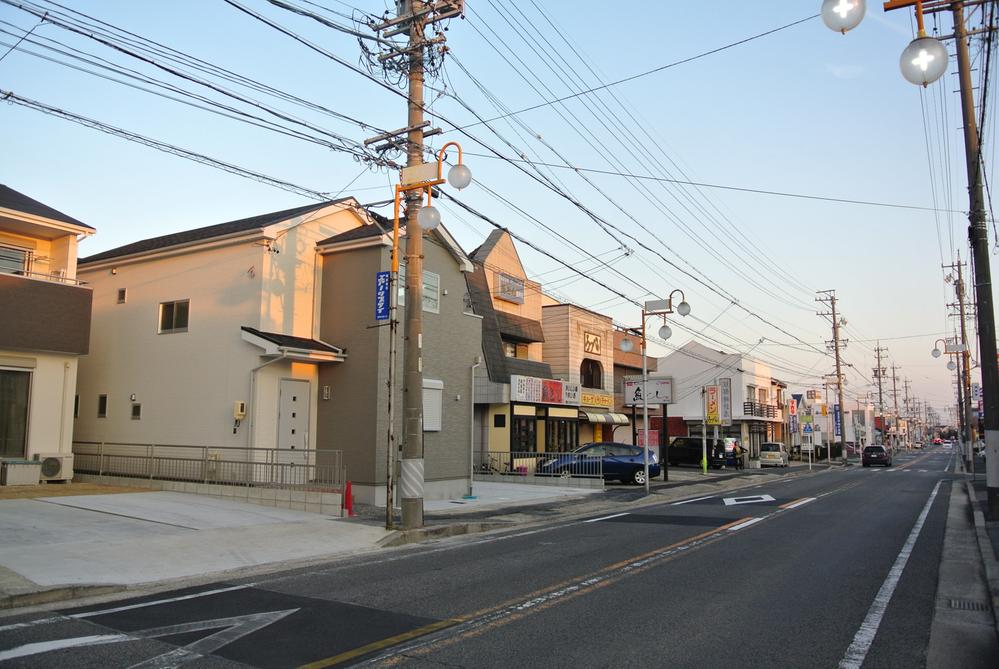 Local photos, including front road. 1 Building