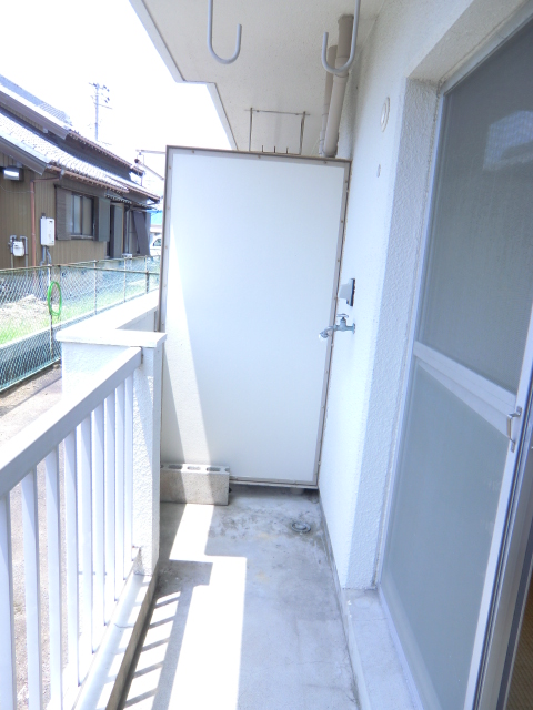 Balcony. There is a washing machine storage on the balcony.