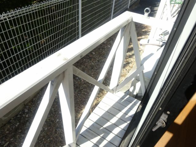 Balcony. It does not become completely exposed to view the room from the front door. 