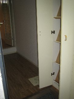 Entrance. Compact with cupboard.