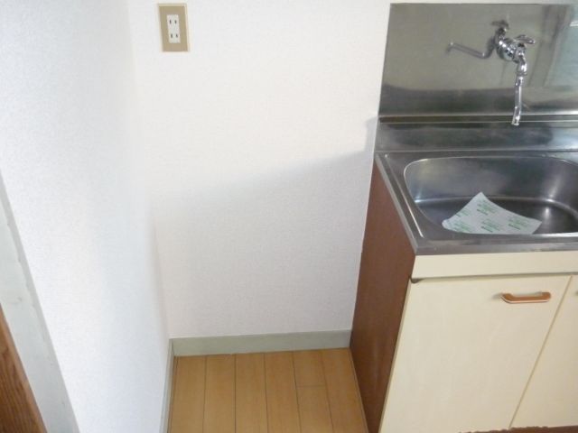 Living and room. Refrigerator is put in the kitchen.