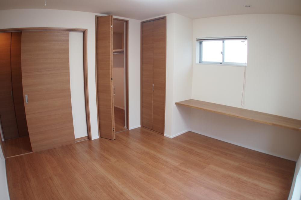 Non-living room. Master bedroom, complete with counter table and a large walk-in closet