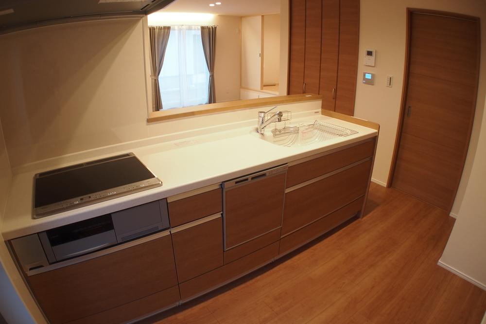 Kitchen. Woodgrain of the kitchen to suit the joinery and flooring