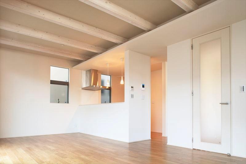 Living. Building B Living 22.1 Pledge of spacious living room that show the ceiling beams, It will spread even more open space. 