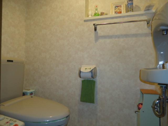 Toilet. Popular wash-basin [looks to the right], Please refer to the storage cupboard is with toilet [with Washlet].