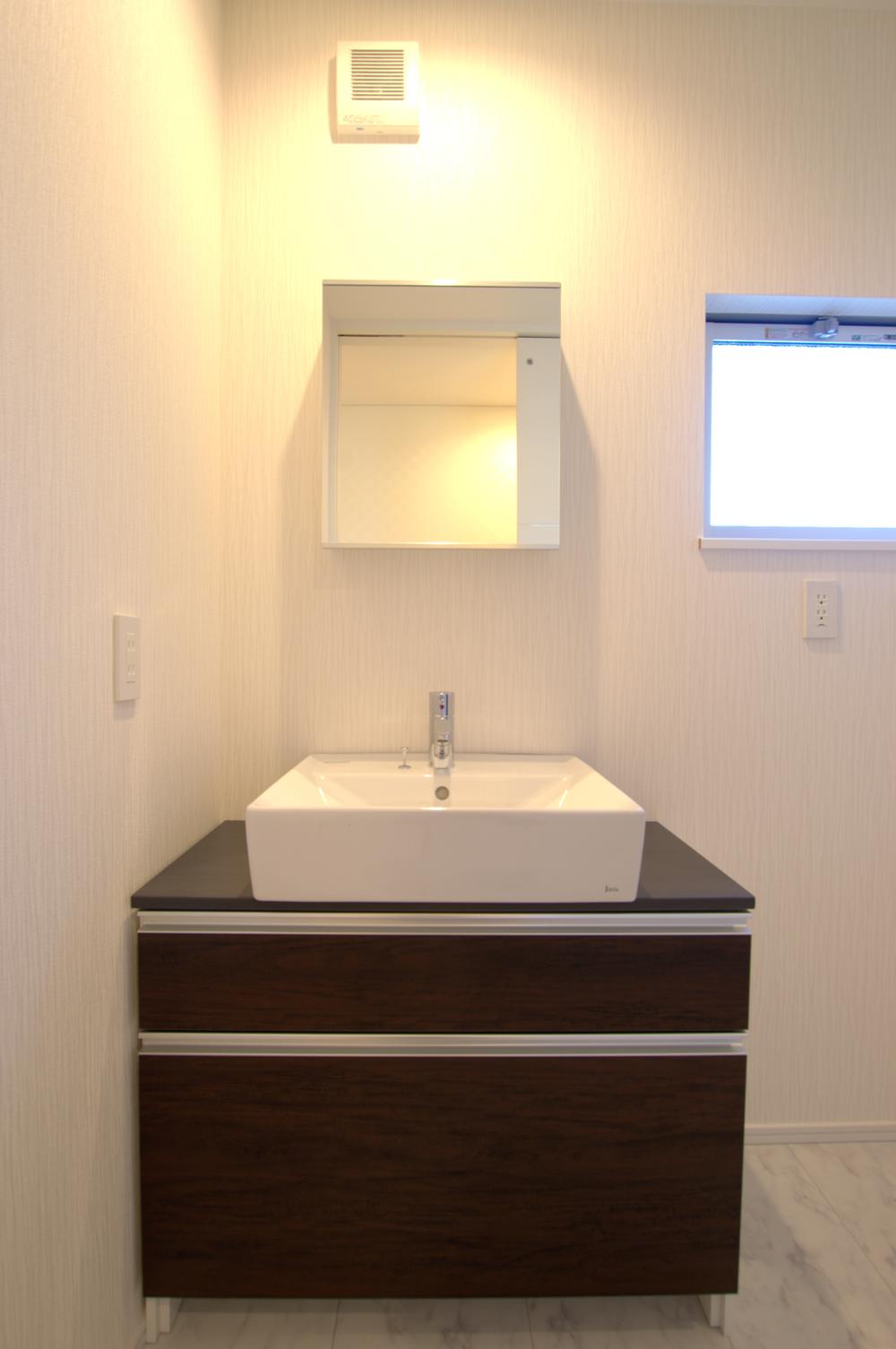 Wash basin, toilet. Stylish bathroom vanity! 