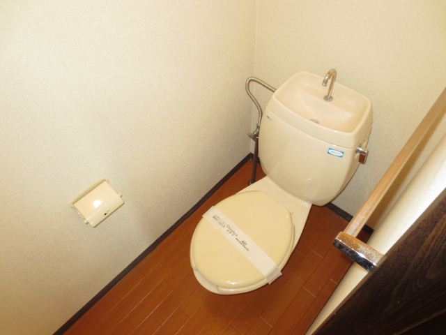 Toilet. Bathroom with window. You can swap the air