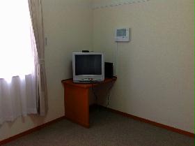 Living and room. tv set, TV stand, Security controller