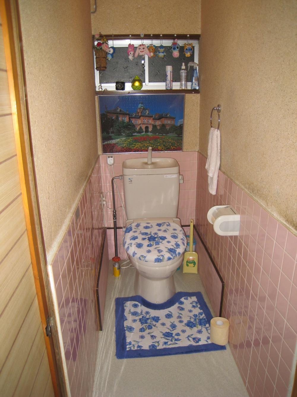 Toilet. Western-style toilets with heated toilet seat. 