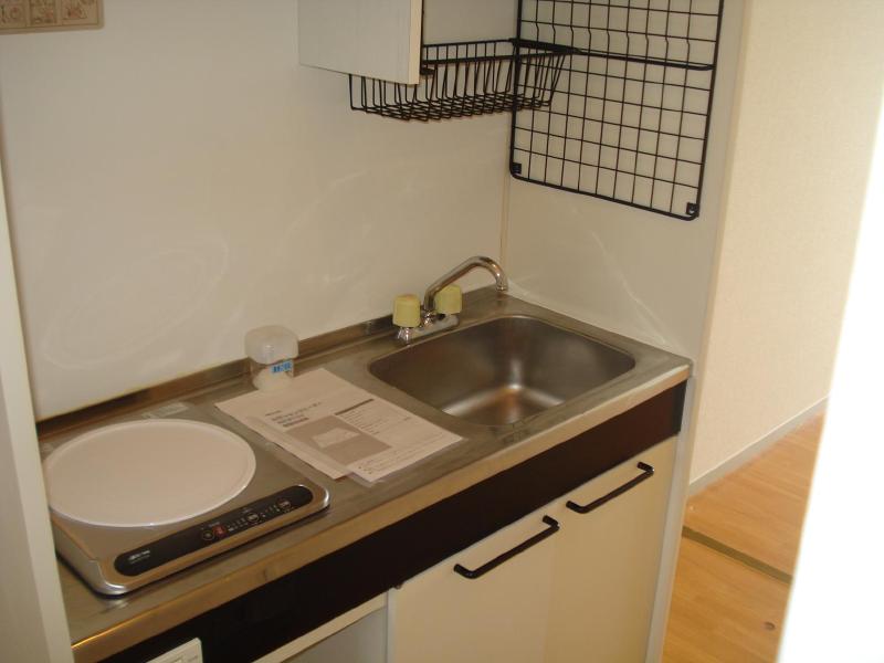 Kitchen. IH with a stove with a clean kitchen