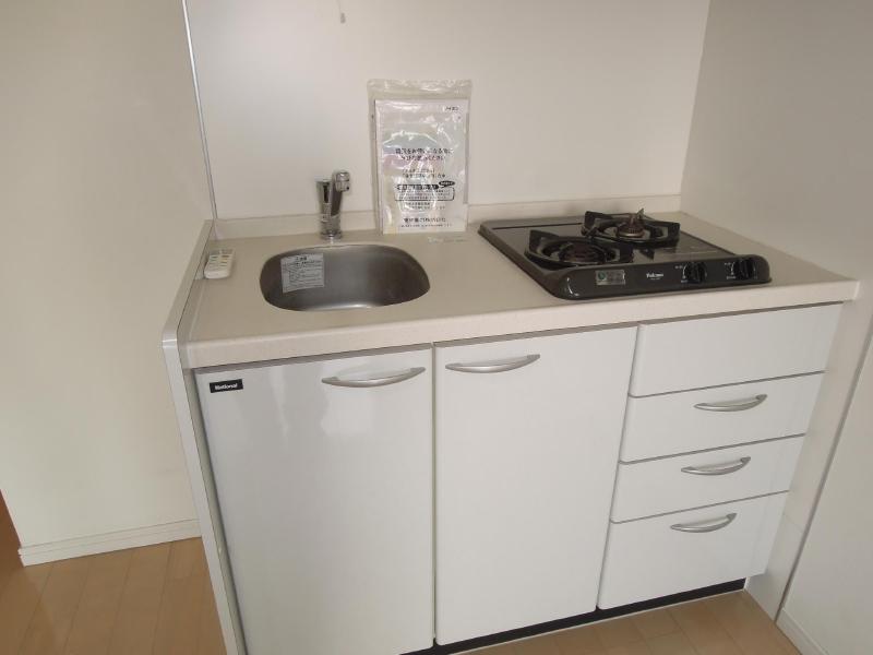 Kitchen. Two-burner gas stove with a clean kitchen