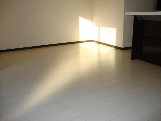 Living and room. Spacious living room. Stylish white flooring.